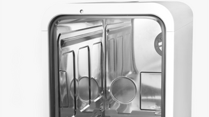 Metallic appliance with open door on a white background