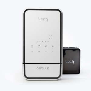 Capsule dishwasher with 'Loch' branding on a white background