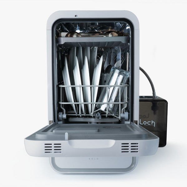 Portable dishwasher with open door showing clean cutlery inside, on a white background.