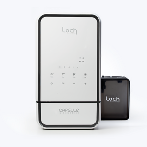 Capsule dishwasher with Loch branding on a white background